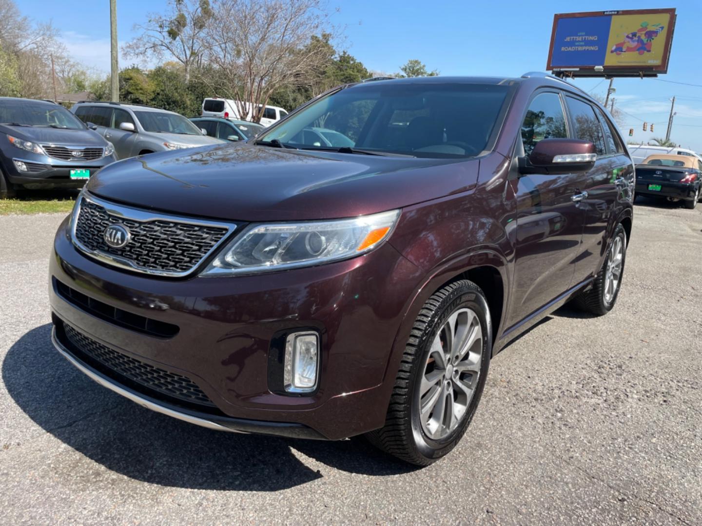 2015 PLUM KIA SORENTO SX (5XYKW4A77FG) with an 3.3L engine, Automatic transmission, located at 5103 Dorchester Rd., Charleston, SC, 29418-5607, (843) 767-1122, 36.245171, -115.228050 - Local Trade-in with Leather, Panoramic Sunroof, Navigation, Backup Camera, CD/AUX/Sat/Bluetooth, Dual Climate Control, Power Everything (windows, locks, seats, mirrors), Heated/Cooled/Memory Seating, Power Liftgate, Convenient Third Row, Push Button Start, Keyless Entry, Alloy Wheels. Certified One - Photo#2